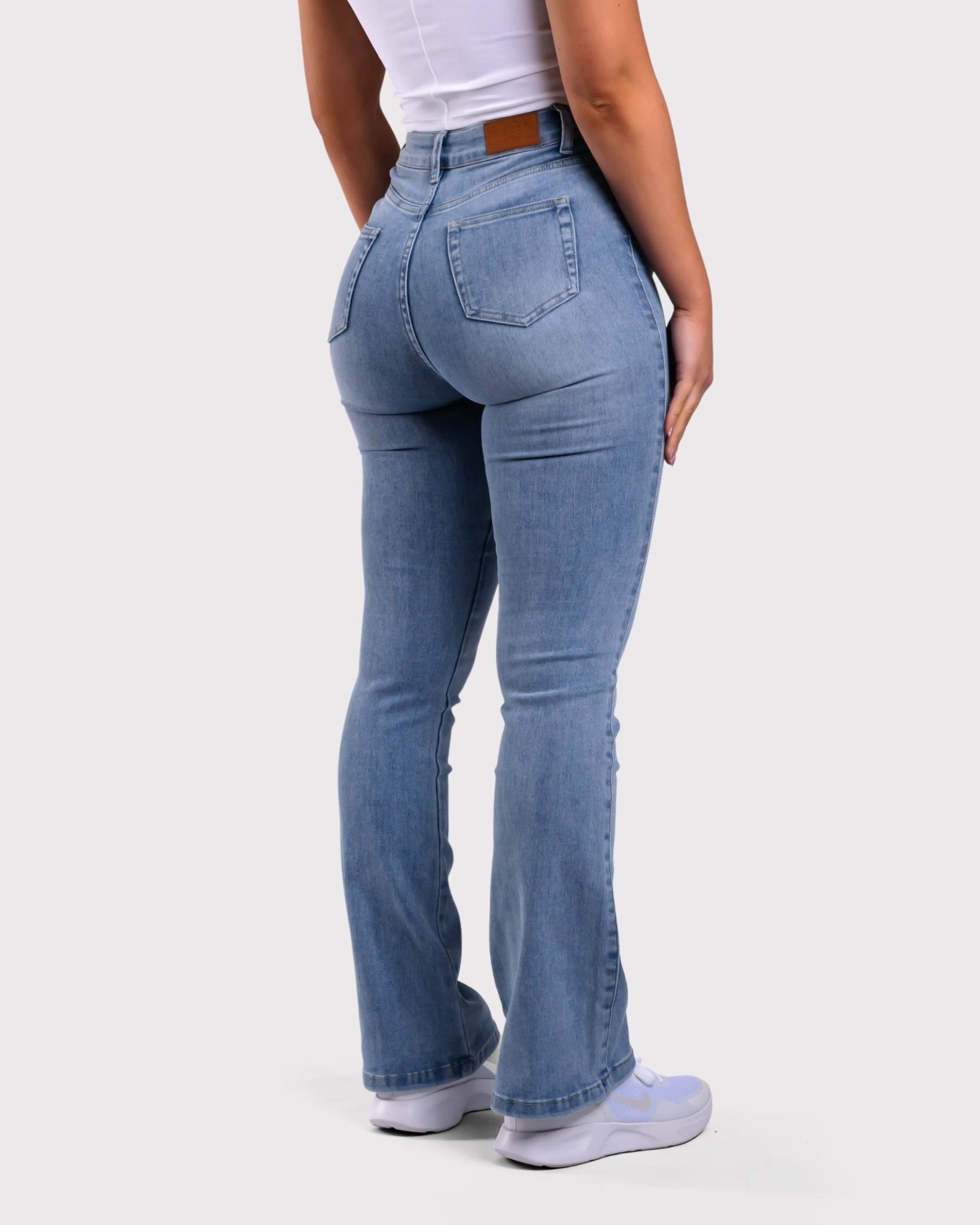 Light Blue Flared Jeans - Peach Tights -