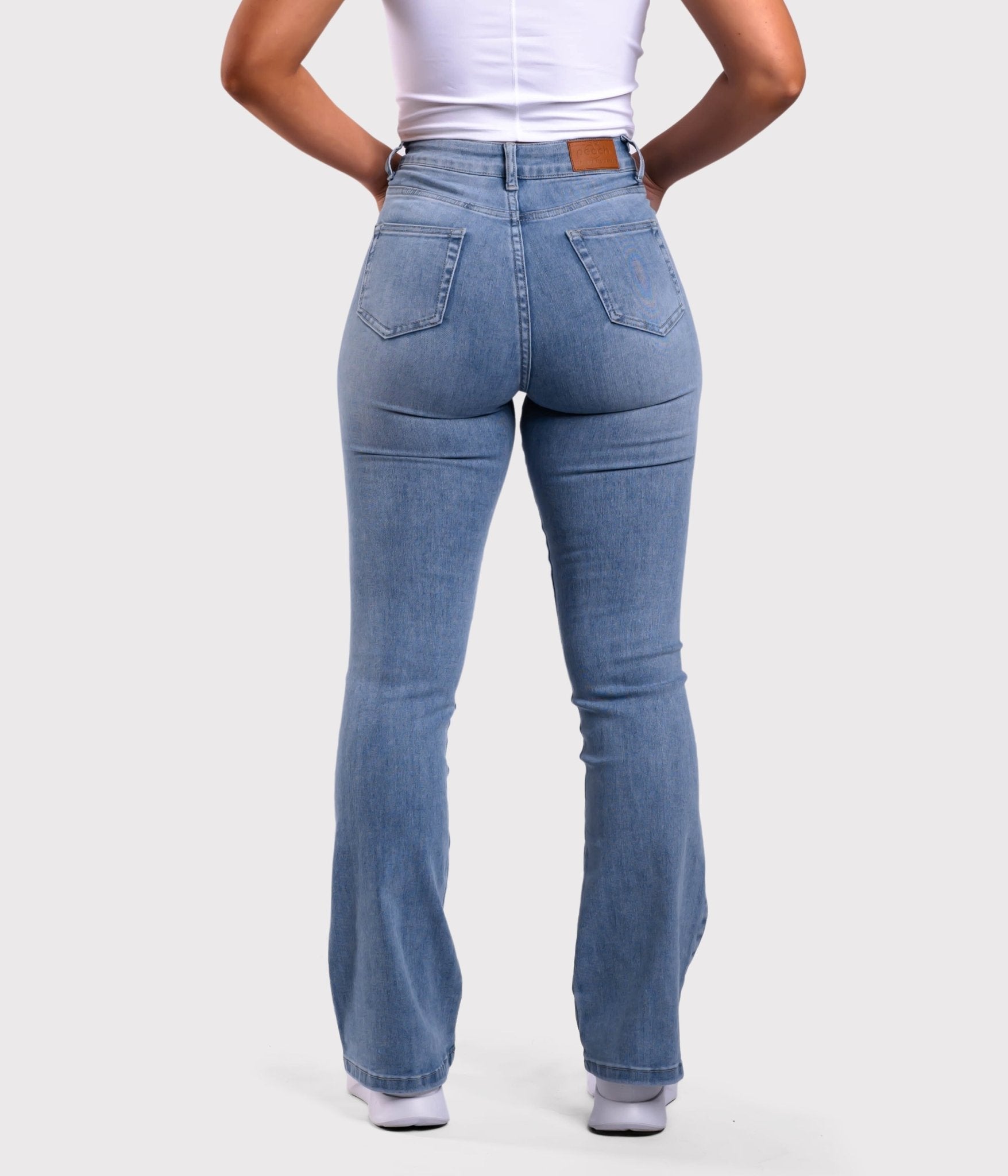 Light Blue Flared Jeans - Peach Tights -